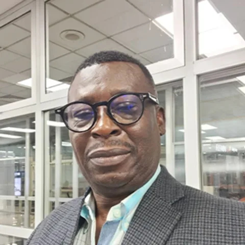 Dr. Tony Karbo